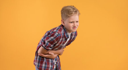 Unwell Teen Guy Suffering From Abdominal Pain
