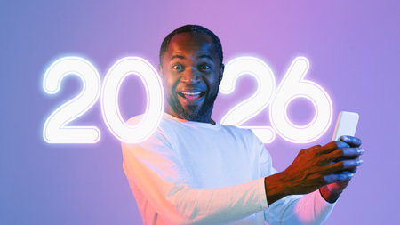 Surprised Middle Aged Black Man With Smartphone in Colorful Neon Studio Setting