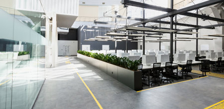 Office interior with open space and yellow restrictive zonesの写真素材