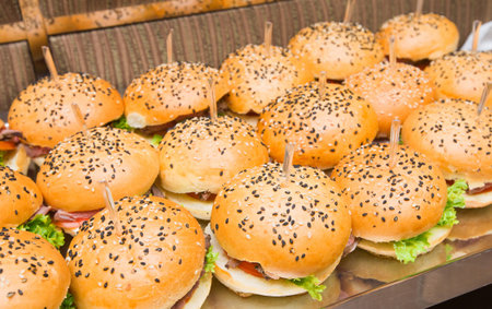 Catering - served table with hamburgers snackの写真素材