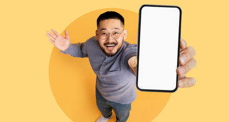 Cheerful Person Holding Smartphone in Bright Setting While Posing for a Fun Collage Montageの写真素材