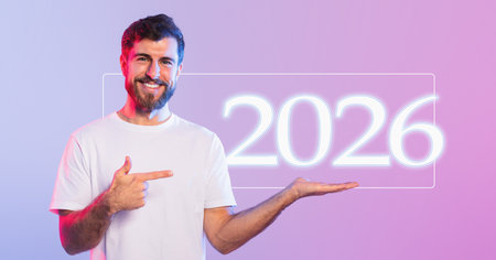 Cheerful Man in White T-Shirt Gestures With Vibrant Background Hinting at the Futureの写真素材