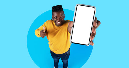 Creative Collage Showcasing a Person Holding a Smartphone and Giving a Thumbs up While Smiling...