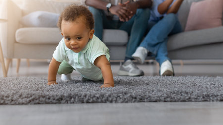 Cute baby toddler walking in living room making first steps