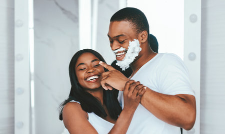 Portrait Of Cheerful African American Couple Having Fun In Bathroom