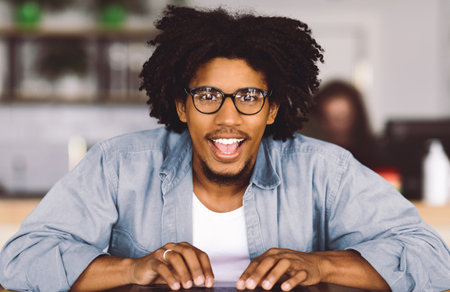 Black Guy In Eyeglasses Typing On Laptop And Looking At Screen, Povの写真素材