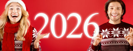 Celebrating the Festive Spirit With Joyful People in Winter Attire for the Upcoming Year 2026の写真素材