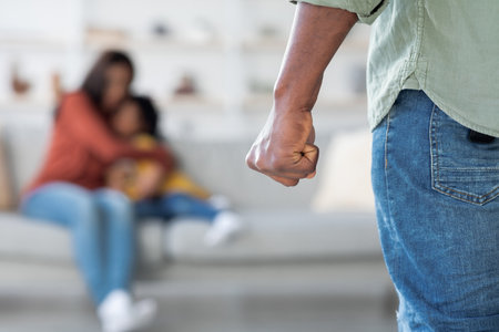 Conflict Between Family Members in Living Room During Emotional Momentの写真素材