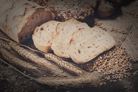 Bakery concept. Plenty of sliced bread backgroundの写真素材