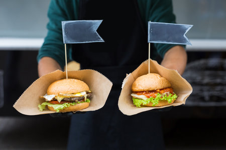 Street fast food festival, hamburgers with beef and bbq