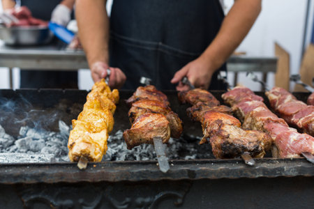 Street fast food festival, beef and chicken kebab at grillの写真素材