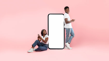 Happy Couple Enjoying Modern Communication While Leaning on a Large Smartphone Screen
