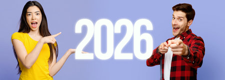 Confident Millennial Girl Poses With a Smiling Young Man Against a Colorful Backgroundの写真素材