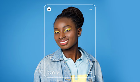Portrait of a Young Woman With Colorful Makeup and Denim Attire Against a Blue Background