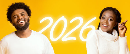 Confident Young Asian Woman Smiling With Folded Arms Over Purple Background in Studioの写真素材