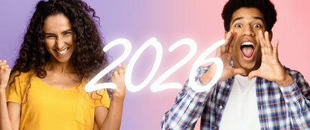 Confident Young Woman Smiling With Folded Arms Against a Colorful Backgroundの写真素材