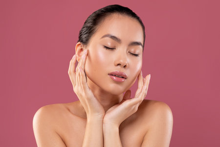 Korean Lady Experiences Morning Beauty Routine With Glowing Skin and Relaxationの写真素材