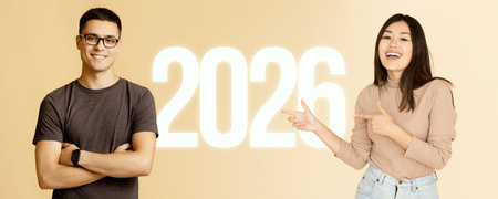 Confident Millennial Girl Smiles While Pointing at Numbers in a Bright Settingの写真素材