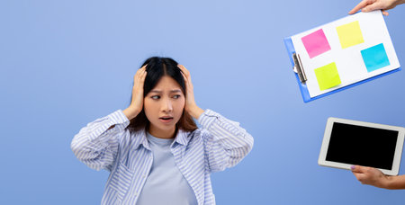 Woman Feeling Stressed While Receiving Information During a Meetingの写真素材