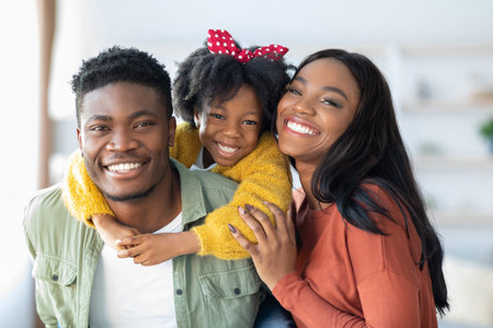 Happy Family Enjoying Quality Time Together at Home With Smiles and Laughterの写真素材