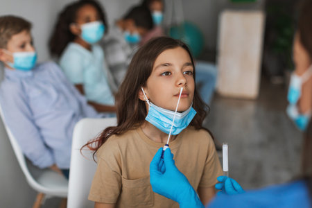 Girl Undergoes Coronavirus Test With Group of Children in Clinic Setting