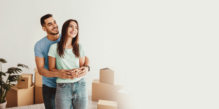 Couple Celebrates Their New Home Together While Surrounded by Moving Boxes