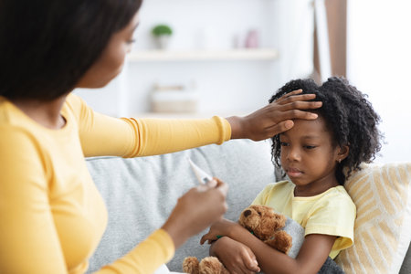Mother Caring for Sick Child While Measuring Temperature in Cozy Living Room Setting on a Calm Day