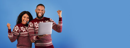 Wow x-mas offer. Overjoyed african american couple celebrating success with laptop, blue studio...