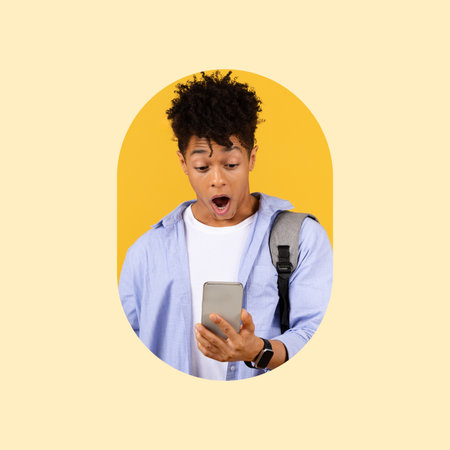 Excitement Shows as Young Person Reacts While Using Smartphone in Bright Setting