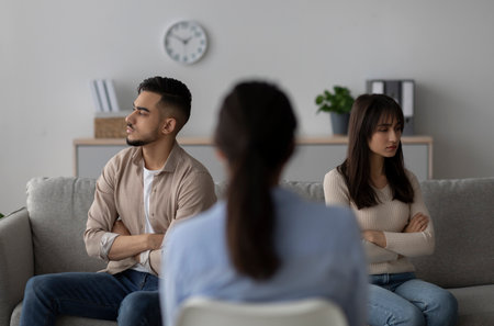 Psychologist Assists Young Couples in Family Conflict Resolution at Counseling Clinicの写真素材