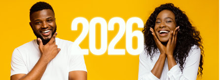 Confident Millennial Couple Smiling Together With Folded Arms Over a Bright Backgroundの写真素材