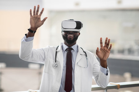 Excited african american doctor testing modern technologies in healtchare