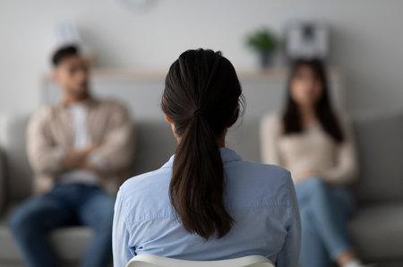 Consulting a Young Arab Couple in a Modern Psychology Office Settingの写真素材