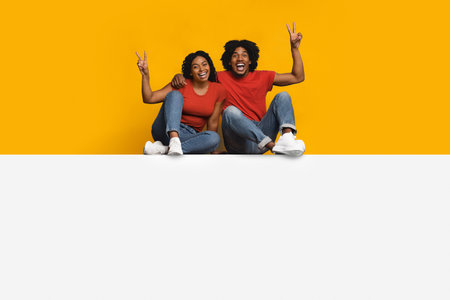 Friends Enjoying a Happy Moment Together With Cheerful Expressions and Vibrant Backgroundの写真素材