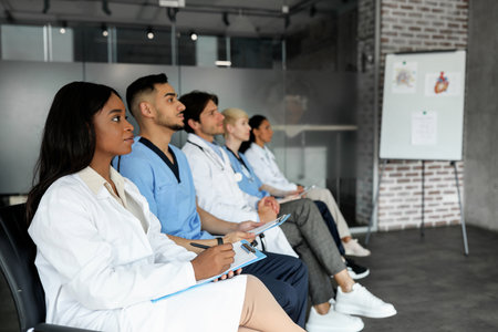 Professional multiethnic group of healthcare employees having medical conferenceの写真素材