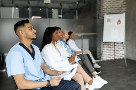 Multiracial group of doctors attending medical conferenceの写真素材