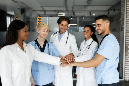Multiethnic team of doctors motivating each otherの写真素材