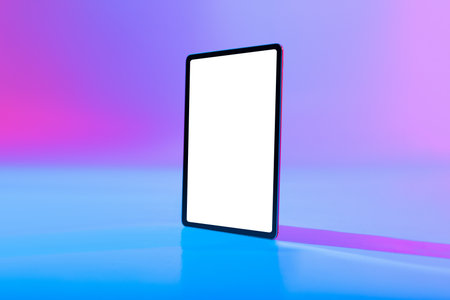 Blank Digital Screen Stands on a Colorful Background for Creative Design Purposesの写真素材