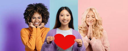 Women in Colorful Outfits Holding a Heart Symbol While Shopping in a Trendy Locationの写真素材