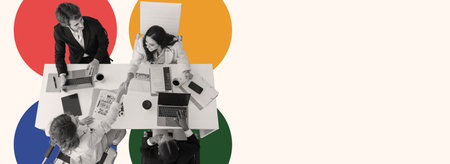 Business Team Collaborating at a Modern Workspace With Colorful Design Elementsの写真素材