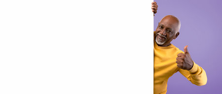 Man Gives a Thumbs up While Standing Next to a Blank White Panel Against a Purple Background