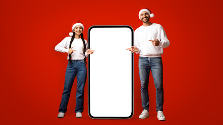 Cheerful Friends Sharing Holiday Joy With a Large Blank Smartphone Display in a Festive Setting