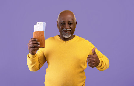 Happy Man Shows Travel Documents With a Thumbs up Against a Purple Background
