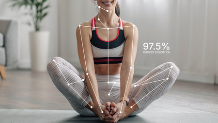 Yoga Practice in a Bright Room With Body Alignment Tracking and Performance Data Display