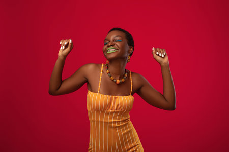 Relaxed millennial african american lady enjoying summer holidayの写真素材