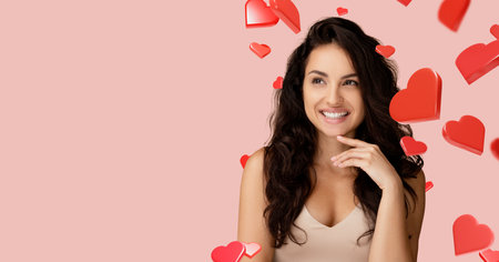 Happy Woman Enjoys Self-Care While Smiling and Feeling Her Skin With Hearts Around Herの写真素材