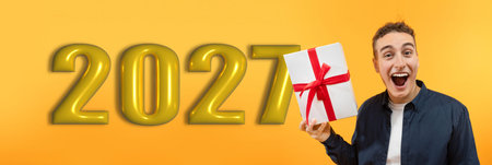 Collage of Celebration and Joy With Gift and Year Displayed in Vibrant Colorsの写真素材