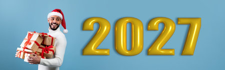 Happy New Year Celebrations With Gifts and Festive Mood in 2027の写真素材