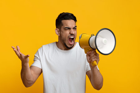 Middle eastern guy with loudspeaker gesturing
