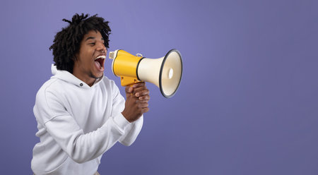 Emotional teen guy shouting into megaphone, announcing breaking news over violet background